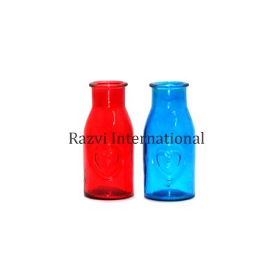 BOTTLE VASE
Item Code: A 666
Finish: Red & Turquoise 
Material: Glass
Keywords: BOTTLE VASE
